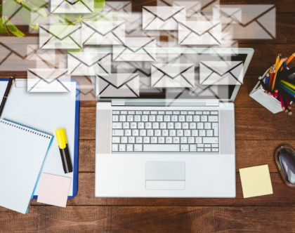 workdesk-with-envelopes-laptop-scaled
